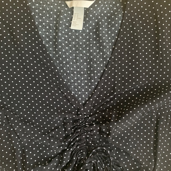 Polka-dot Peplum Top - Picture 3 of 3